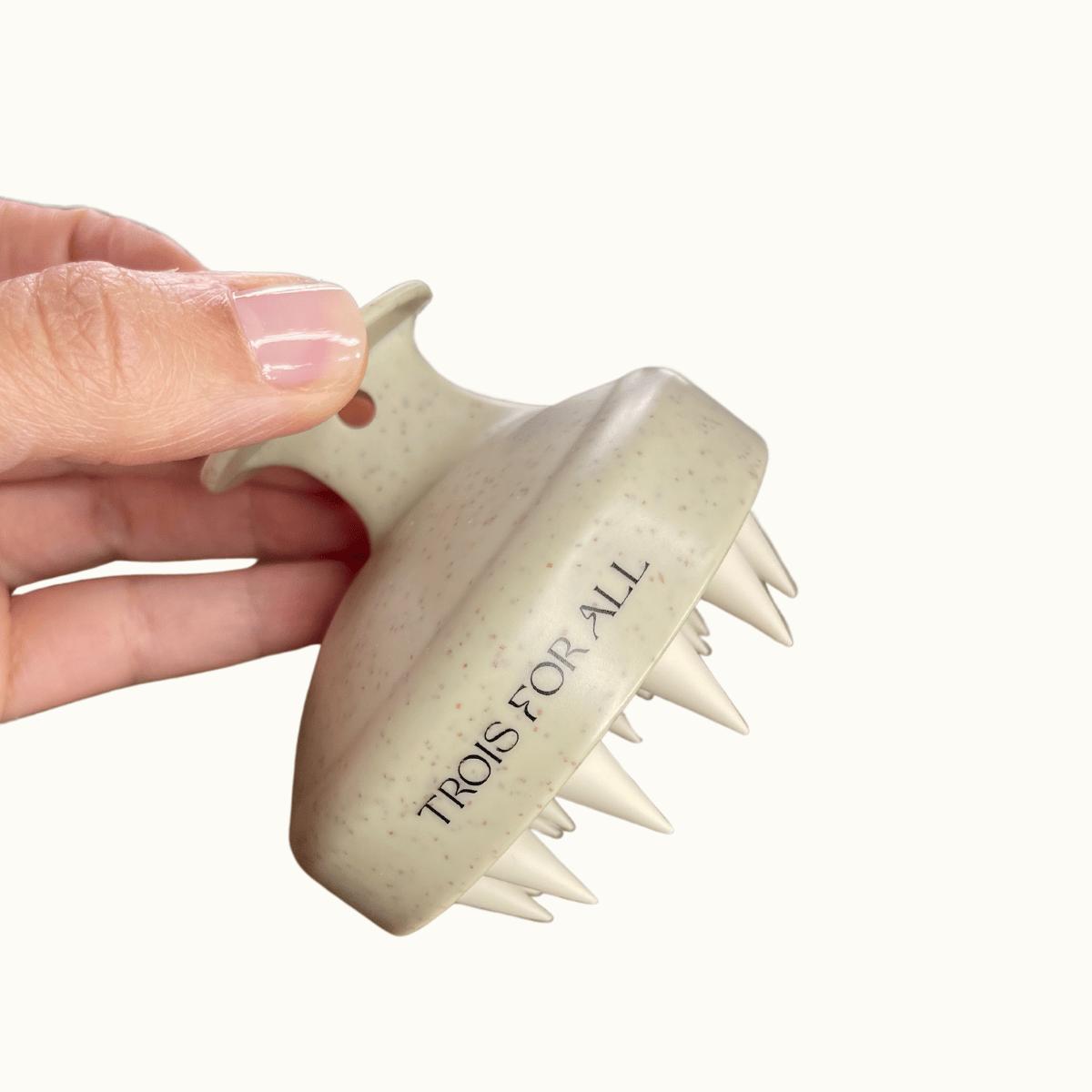Brosse de massage pour cuir chevelu qui stimule la pousse des cheveux et détend le cuir chevelu grâce à ses picots doux