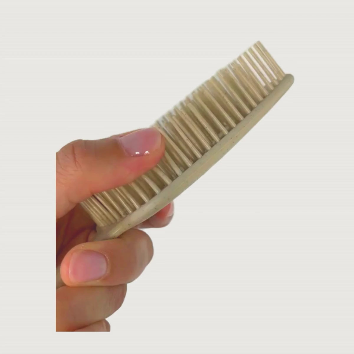 Vidéo détaillant la brosse cheveux bouclés