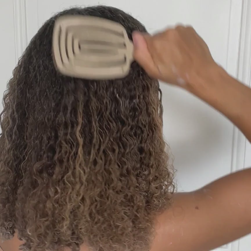 Vidéo d'utilisation de la brosse cheveux bouclés